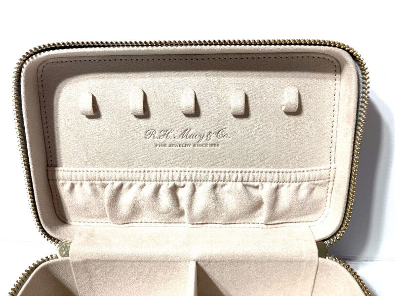 Photo 5 of A spacious jewelry GREY case that can store a variety of jewelry pieces, keeping them secure and organized within multiple compartments, and a drawstring pouch. Ideal for a long trip or a short getaway. Removable drawstring pouch - Necklace Hooks - Elasti