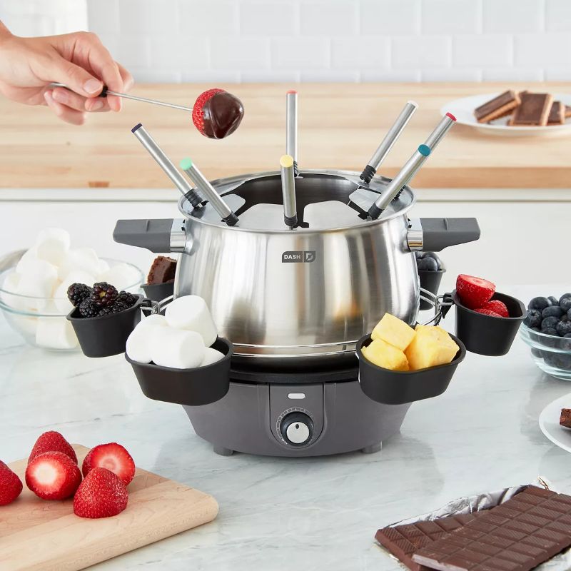 Photo 2 of Dash Deluxe Fondue Maker. Entertaining is easy and delicious with this deluxe fondue maker from Dash. It features a three-quart capacity and a nonstick interior perfect for cheese, chocolate and more. It includes fondue cups for serving up fruits, veggies