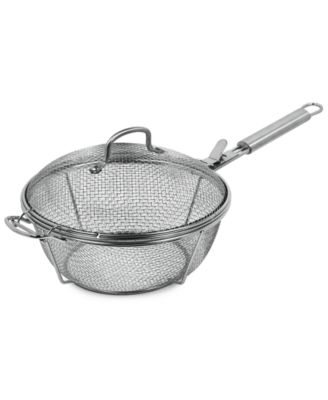 Photo 1 of Sedona Small Grill Basket. The sturdy mesh of this Sedona grill basket helps keep food from falling through the grates, while a nonstick coating makes cooking and cleanup a breeze. Approx. dimensions: 12.5"L x 11.45"W x 5.5"H. Non-stick coating. Helper ha