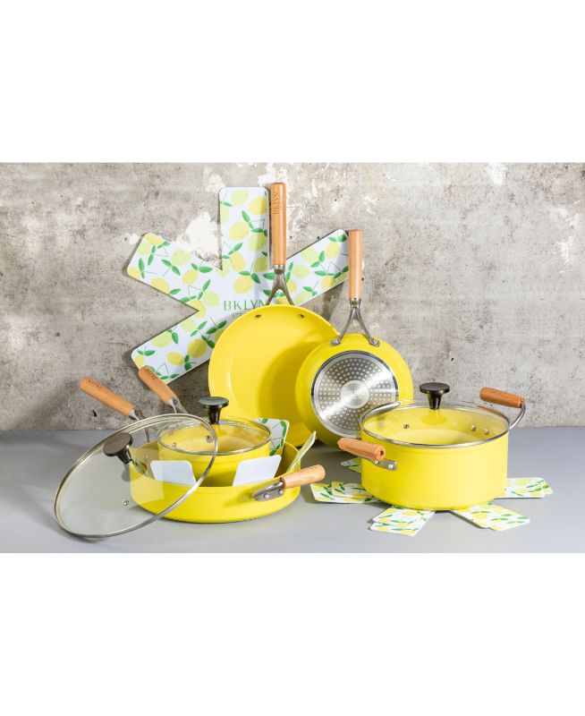 Photo 1 of Brooklyn Steel Co. Atmosphere 12-pc. Aluminum Nonstick Cookware Set, Yellow. The Atmosphere Cookware Collection from Brooklyn Steel Co. fuses forged aluminum construction with a polished matte ceramic coating for a polished nonstick cooking surface. The A