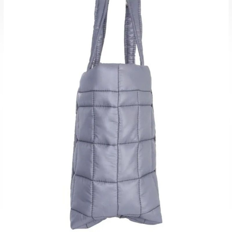 Photo 7 of Michael Kors Stirling Large Puffy Tote. Michael Kors Ladies Tote. Color: Grey. Michael Kors Stirling Large Quilted Padded Tote Bag - Grey. A quilted tote bag from Michael Kors features dual top carry handles, one main internal compartment and a silver-ton