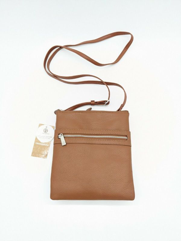 Photo 3 of GIANI BERNINI Dasher pebble leather triple zip women's crossbody organizer -TAN. GIANI BERNINI triple-zip dasher pebble genuine leather women's crossbody organizer bag purse
Carry the essentials in this every-day bag designed by Giani Bernini.
Solid brown