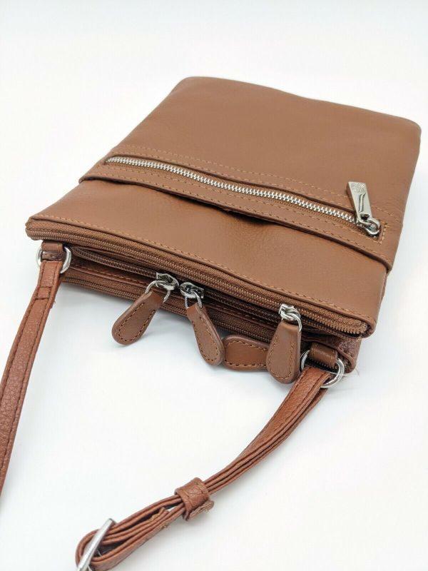 Photo 5 of GIANI BERNINI Dasher pebble leather triple zip women's crossbody organizer -TAN. GIANI BERNINI triple-zip dasher pebble genuine leather women's crossbody organizer bag purse
Carry the essentials in this every-day bag designed by Giani Bernini.
Solid brown