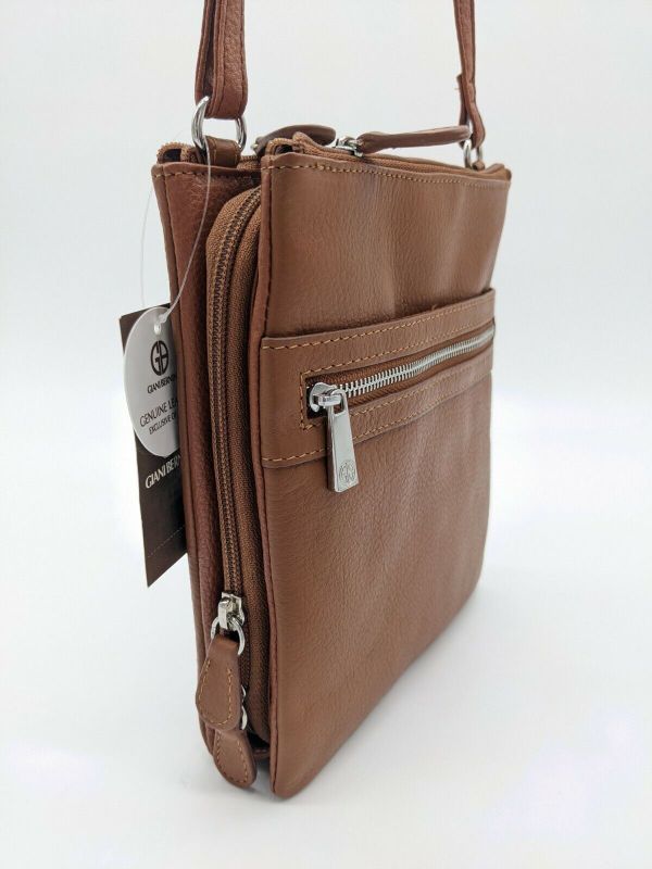 Photo 7 of GIANI BERNINI Dasher pebble leather triple zip women's crossbody organizer -TAN. GIANI BERNINI triple-zip dasher pebble genuine leather women's crossbody organizer bag purse
Carry the essentials in this every-day bag designed by Giani Bernini.
Solid brown