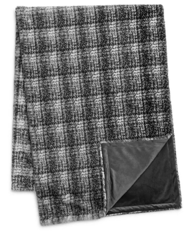Photo 1 of Drew & Jonathan Home Plaid Faux Fur Throw, 50" x 70". Bring a modern touch to your home décor with this Drew & Jonathan Home plaid faux fur throw. Made with ultra-soft fibers, this oversized throw complements any decorated space. Faux Fur - Polyester - Dr