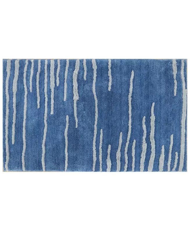 Photo 1 of Riviera Home Overtuft Forma 27" x 45" Accent Rug. Make your house a home by adding the tufted polyester accent rug to your space. Constructed out of tufted material, this durable rug boasts a charming design of color and warmth that will look lovely in an