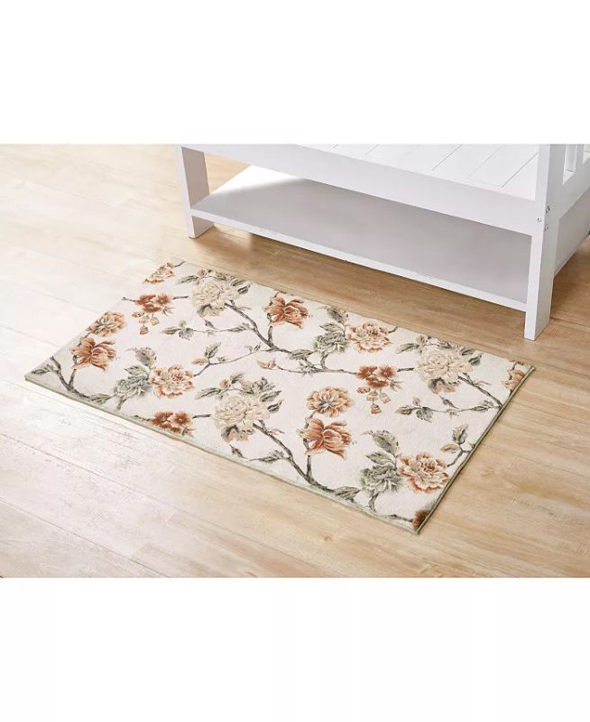 Photo 1 of Seventh Studio Ardenna 27"x 45" Accent Rug Bedding. Add botanical beauty to any room with the Seventh Studio Ardenna Accent Rug, which features muted rust, beige, and grey florals on an ivory background for a vintage feel. Made of microfiber, this soft an