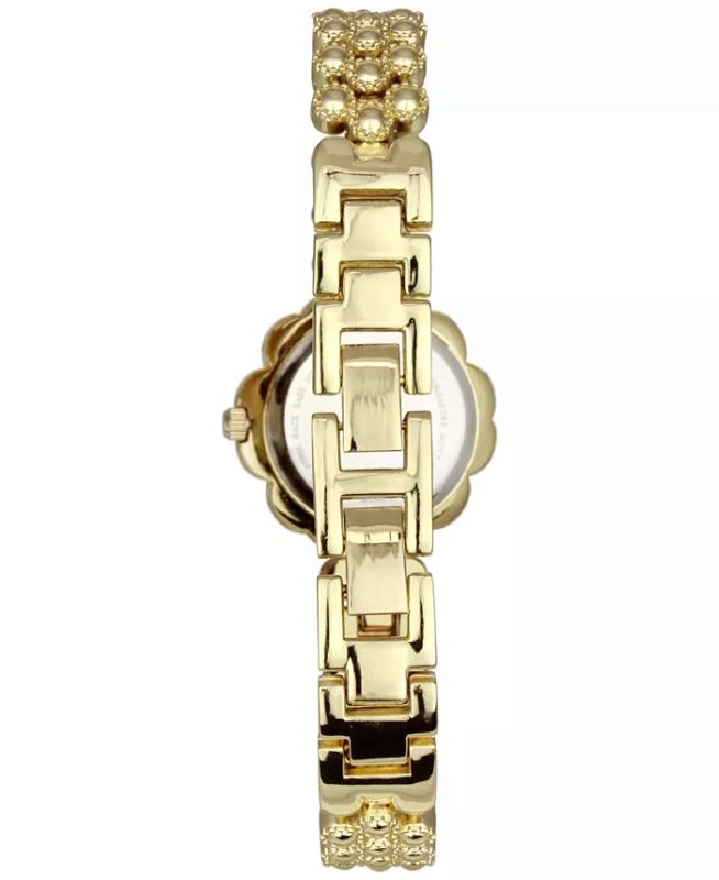 Photo 2 of CHARTER CLUB Women's Crystal Flower Gold-Tone Bracelet Watch 35mm. Pay homage to spring no matter the season with this pretty crystal-covered timepiece. Movement: three-hand quartz. Case: flower-shaped with crystals; 35mm. Strap: gold-tone bracelet with c