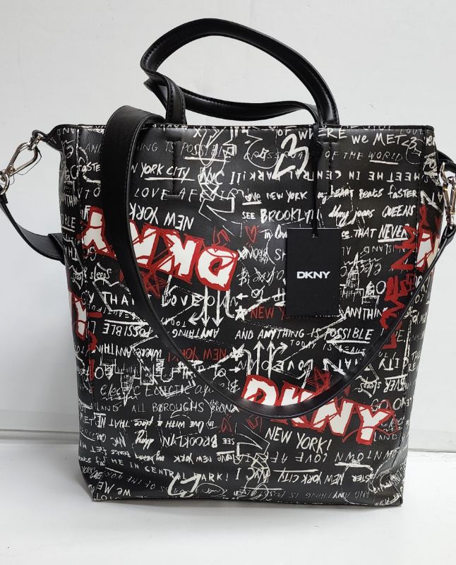 Photo 1 of DKNY WOMEN'S LEATHER BLACK GRAFFITI TOTE
INTERIOR AND EXTERIOR POCKET- ZIPPER - ADJUSTABLE STRAP