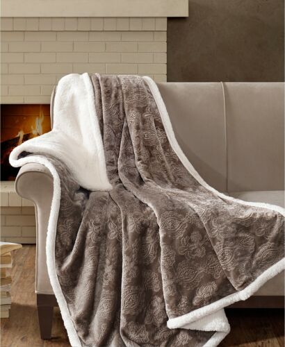Photo 1 of Madison Park Elma 60" x 70" Embossed Plush Throw. Surround yourself in luxurious style and warmth with this Elma oversized throw from Madison Park, featuring elegant 3D embossing on a soft velour ground and a cozy berber reverse.