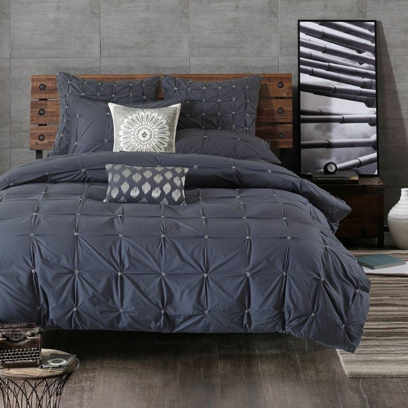 Photo 1 of King Size Luxury 3pc Navy Blue & Grey 200TC Cotton Comforter AND Decorative Shams. Elevate your bedroom with the INK+IVY Masie 3 Piece Elastic Embroidered Cotton Comforter Set. This solid cotton comforter features elastic and embroidered details on the fa