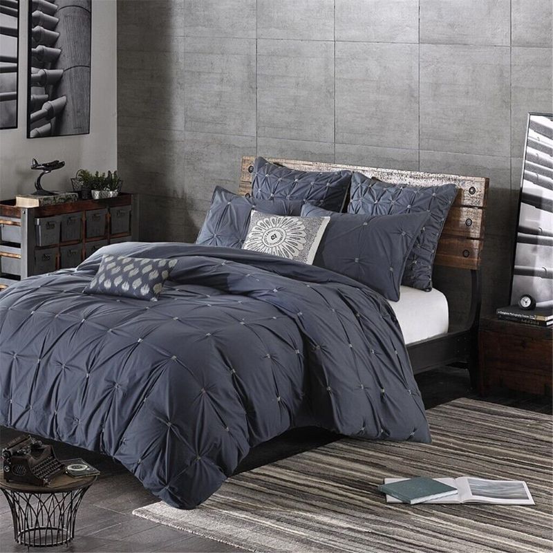 Photo 2 of King Size Luxury 3pc Navy Blue & Grey 200TC Cotton Comforter AND Decorative Shams. Elevate your bedroom with the INK+IVY Masie 3 Piece Elastic Embroidered Cotton Comforter Set. This solid cotton comforter features elastic and embroidered details on the fa