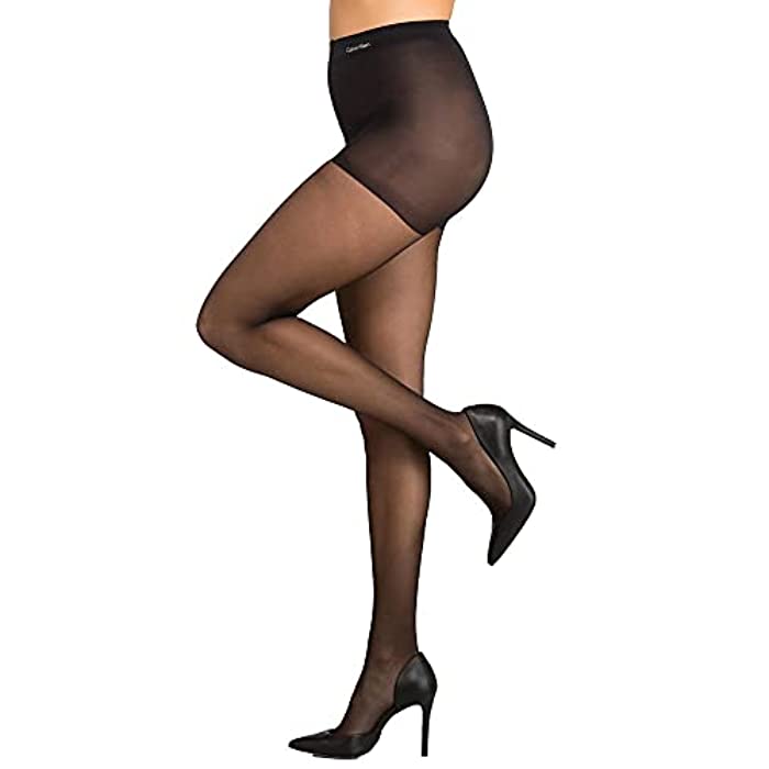 Photo 2 of Size A Calvin Klein Women's Matte Ultra Sheer Pantyhose With Control Top, Black, Size A. These 15 denier matte ultra-sheer pantyhose offer a bare look and understated elegance. Topped with a figure-smoothing control top panty, the silky leg features an in