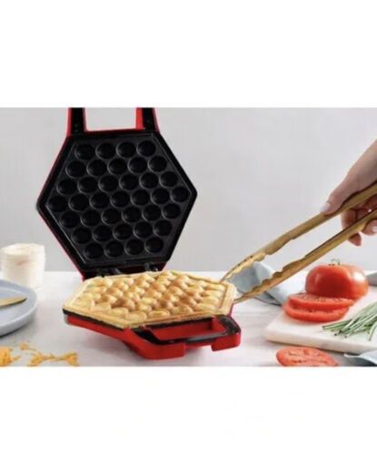 Photo 2 of Bella Bubble Waffle Maker 9” Authentic Hong Kong Style Waffles at Home RED. Make delicious ice cream cones, pizza waffles, grilled cheese, hash browns and more with Bella's bubble waffle maker. Small, round cells on the nonstick plate allow you to cook up