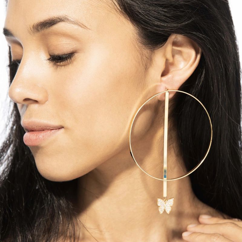 Photo 3 of Evelyn Lozada Bx Glow Duo Hoop Earrings. TRANSFORMING TRIO 3?-GOLD. Triple the power of transformation with these versatile earrings inspired by Evelyn Lozada. They move from a minimalist bar with pearl stud and signature butterfly to adding an airy hoop 
