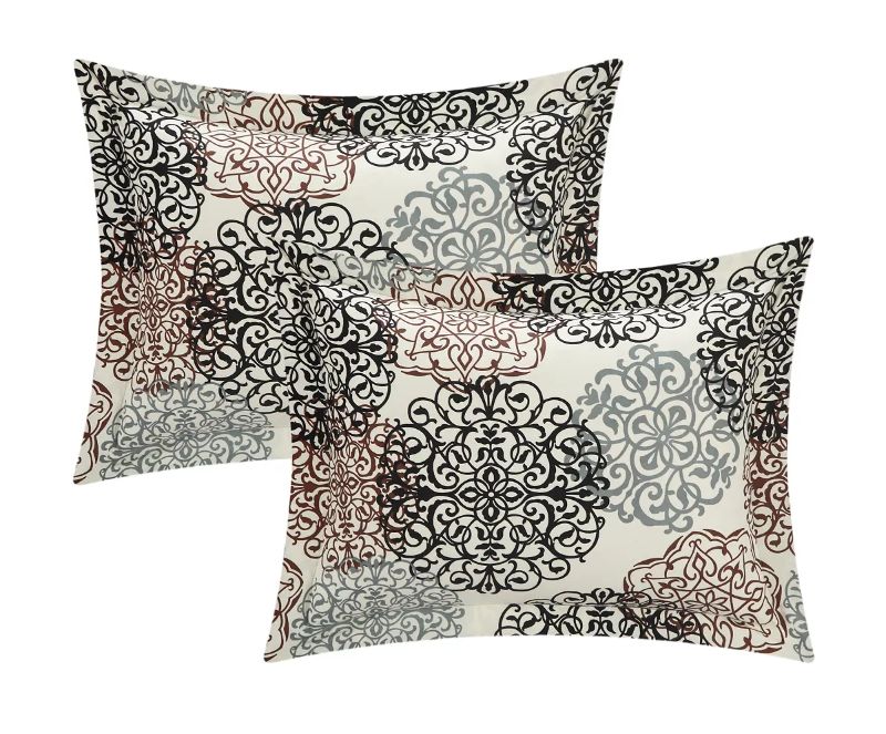 Photo 3 of QUEEN CHIC HOME Kelsie 3 Piece Queen Quilt Set. A fashion forward quilt features a contemporary round scroll design reverses to traditional jacquard motif. Design coordinated shams are included to complete the look. Product dimension - 86"D x 86"W x 1"H. 