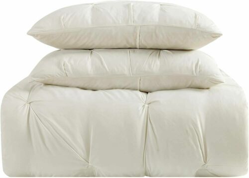 Photo 1 of KING Truly Soft Everyday 3-Piece Ivory King Comforter Set. Pleated face on the comforter and shams with a solid color reverse. The face cloth is 100% microfiber polyester with a pleated finish to provide texture for your bed. Includes: 1 comforter 104x90 