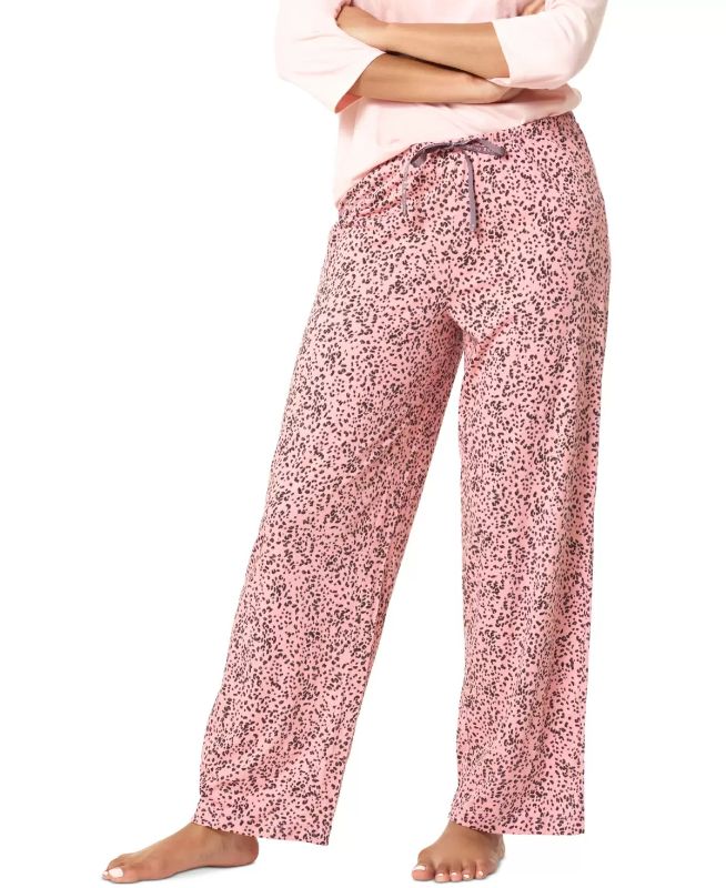 Photo 1 of MEDIUM - HUE Animal Dots Printed Pajama Pants. Spotted for comfortable relaxed style, the Hue Animal Dots classic knit pajama pants are finished with a signature tie at the waist.