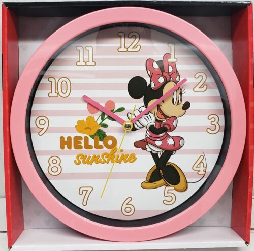 Photo 1 of Minnie Mouse Wall Clock- 10" -  Children can keep track of time and display their fandom of the popular Disney character Minnie Mouse with this Minnie Mouse wall clock. It can be installed on children's bedroom. It measures 10".