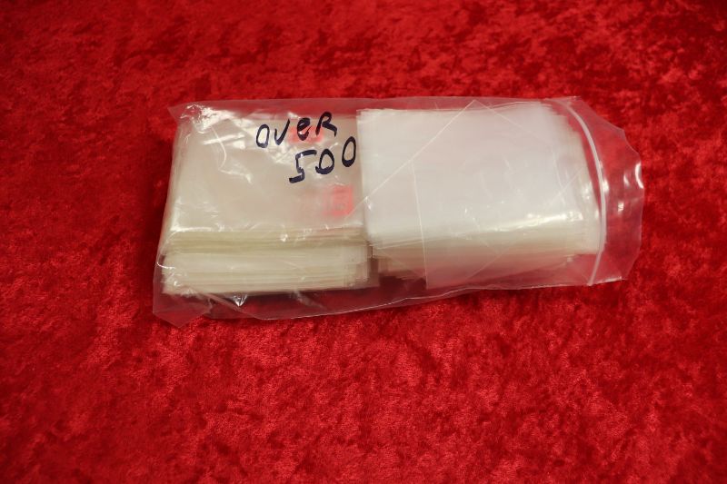 Photo 1 of Over 500 penny sleeves for cards (new & used)
