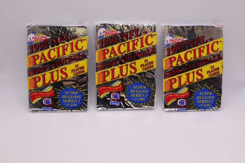 Photo 1 of Lot of 3 1992 Pacific NFL wax packs (sealed)