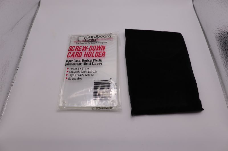Photo 1 of Screw down frame for sports card w/velvet pouch (New)