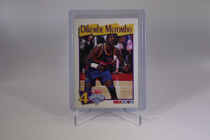 Photo 1 of Dikembe Mutombo 1991 Hoops ROOKIE (EX-NrMt)