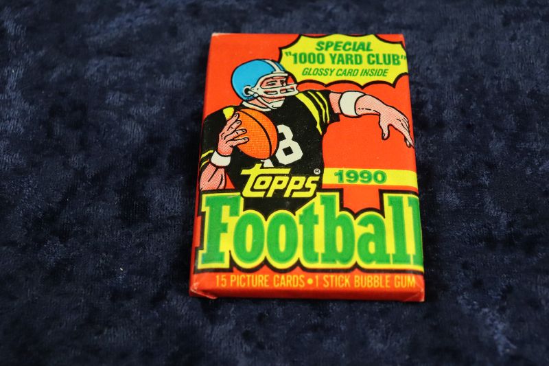 Photo 1 of 1990 Topps Football wax pack (sealed)