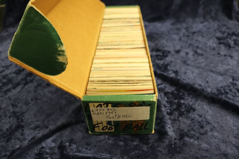 Photo 1 of 800 count box of late ‘80s- early ‘90s Football cards