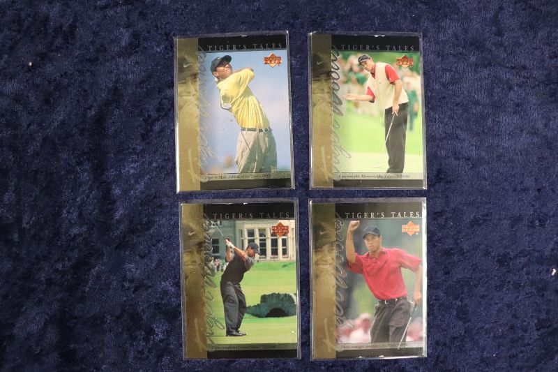 Photo 1 of Lot of 4 Tiger Woods ROOKIE cards 2001 UD with dinged edges