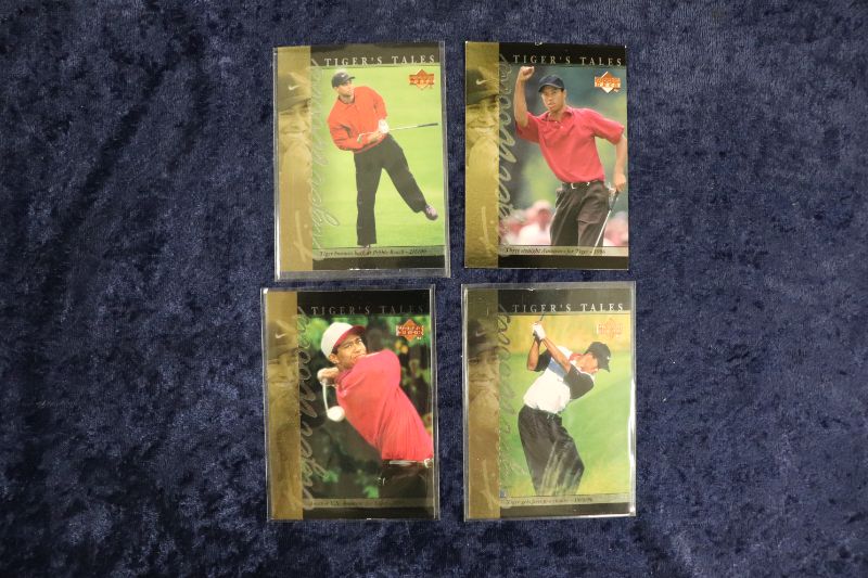 Photo 1 of Lot of 4 Tiger Woods ROOKIE cards 2001 UD with dinged edges