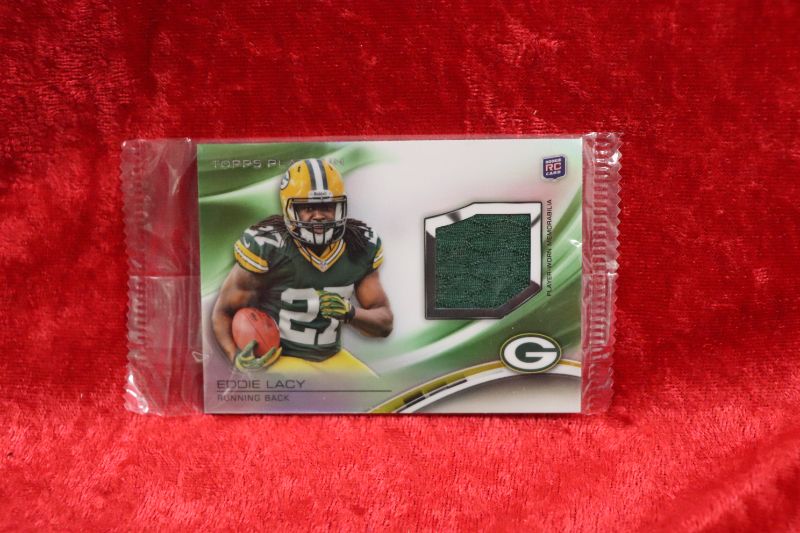 Photo 1 of Eddy Lacy 2013 Topps Platinum ROOKIE jersey card (Sealed)