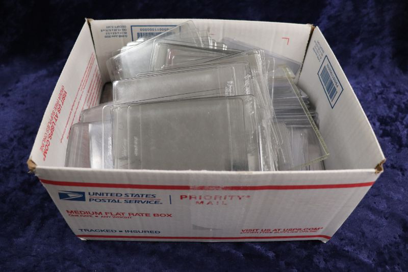 Photo 1 of Large box of used Toploaders and card guards
