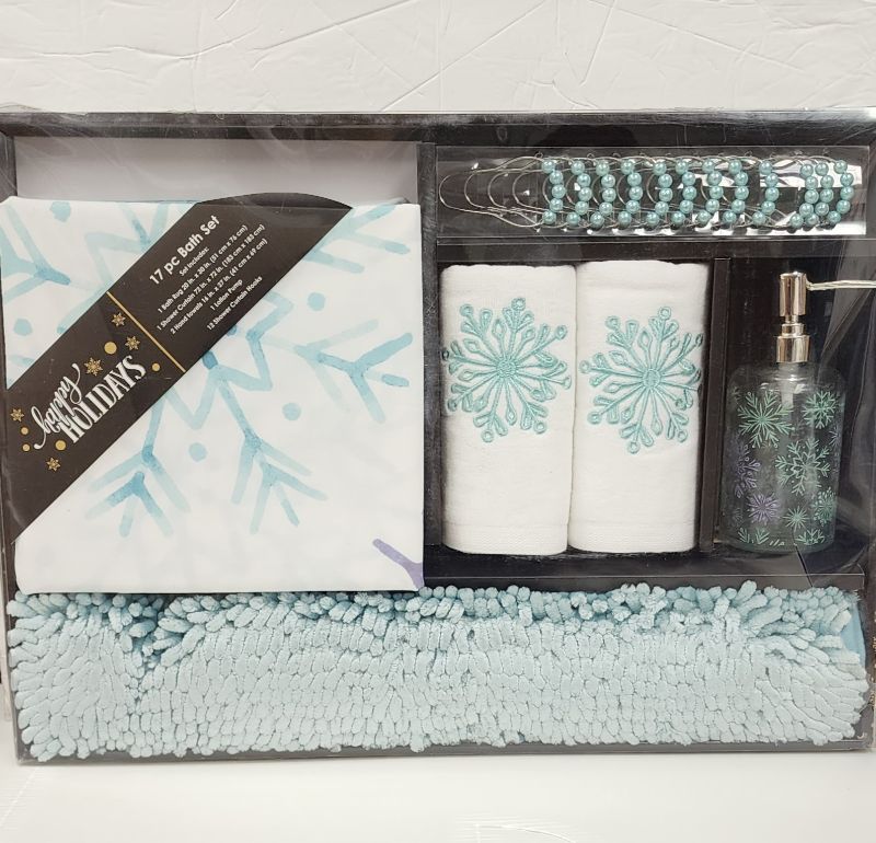 Photo 1 of HAPPY HOLIDAYS 17 PIECE BATH SET
INCLUDES BATH RUG - SHOWER CURTAIN - 2 HAND TOWELS - LOTION PUMP - 12 SHOWER HOOKS