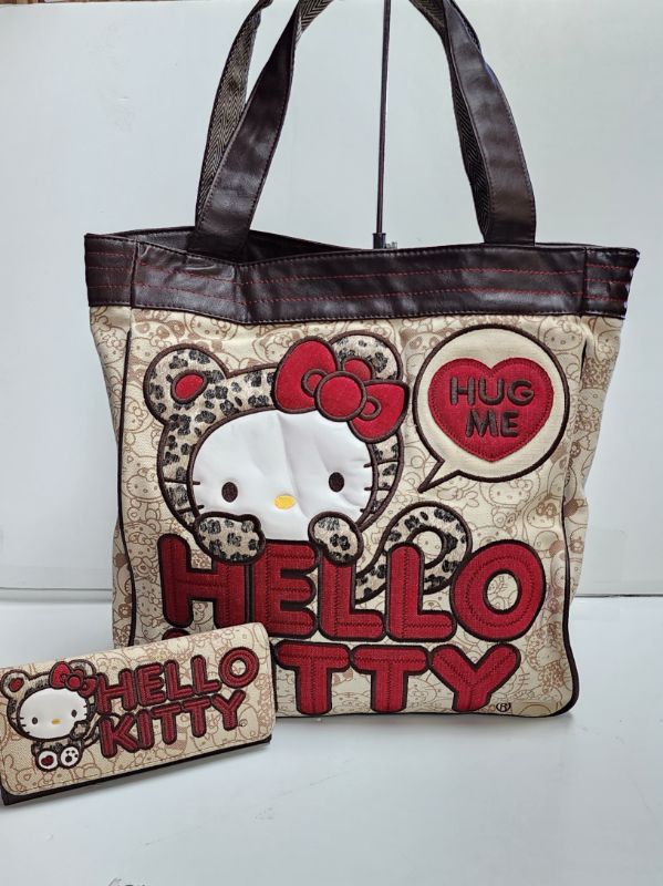 Photo 1 of LOUNGEFLY X SANRIO HELLO KITTY TOTE AND WALLET COLLECTION
LIKE NEW CONDITION