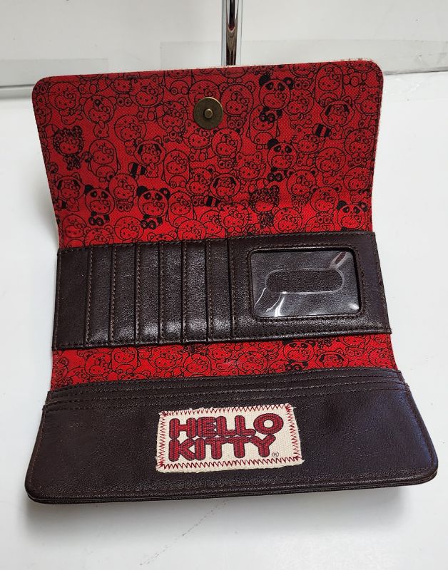 Photo 4 of LOUNGEFLY X SANRIO HELLO KITTY TOTE AND WALLET COLLECTION
LIKE NEW CONDITION