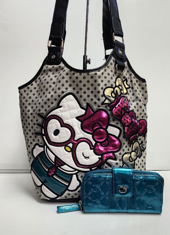 Photo 1 of LOUNGEFLY X SANRIO HELLO KITTY TOTE AND WALLET COLLECTION
LIKE NEW CONDTION