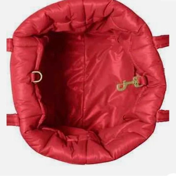 Photo 3 of MICHAEL Michael Kors Stirling Small Grab Tote Red
Top handles, 10" drop
Dimensions: 17.75"W x7.25"D x12.25"H - Dog clip closure
Two exterior slip pockets & three interior slip pockets
Quilted pattern