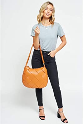 Photo 2 of Urban Expressions Mira Women Messenger Smooth, Woven, Material - Vegan Leather
Material: Vegan Leather
Closure: Zipper Shoulder Strap Drop: 16.5"
Exterior Details: Large woven front panel, saddle bag shape, back zip pocket
Inside Features: Fabric lined, 2
