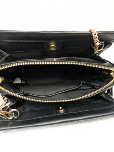 Photo 2 of Alfani Dowel Crossbody, Created for Macy's
Gold-tone hardware.
Color: Black
Dimensions: 9" W x 6" H x 3" D 
Closure: Magnetic snap buttons and zipper.
Fabric: Faux-leather
Lining: Polyester
Strap type: Chain link and leather strap (non-detachable)
Pockets