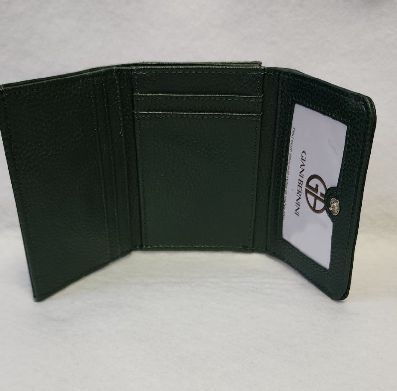 Photo 3 of Giani Bernini Framed Indexer Leather Wallet Green Genuine leather
5-1/4"W x 3-1/2"H x 1"D
Snap-tab closure
Silver-tone hardware; contrast stitching throughout; cutout logo ornament at front
Interior features card slots; 1 full currency pocket; ID window;1