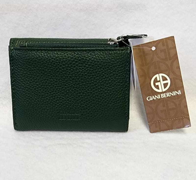 Photo 2 of Giani Bernini Framed Indexer Leather Wallet Green Genuine leather
5-1/4"W x 3-1/2"H x 1"D
Snap-tab closure
Silver-tone hardware; contrast stitching throughout; cutout logo ornament at front
Interior features card slots; 1 full currency pocket; ID window;1