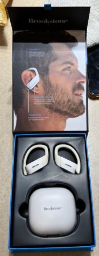 Photo 4 of Brookstone Sport Charge True Wireless Earbuds Sweat-Proof / Noise-Reducing. Bluetooth® technology lets you play crystal-clear, rich audio wirelessly from any smart device while powerful bass and dynamic sound immerse you in every beat. Includes a charging