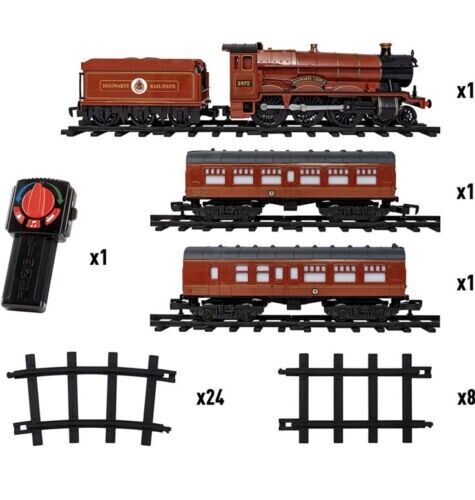 Photo 5 of Harry Potter 37 Piece Train Set Hogwart Express LIONEL Battery Powered Steam. Step through Platform 9 ¾ and take a ride on the Hogwarts Express! Witches, wizards and even Muggles can easily control this battery powered remote controlled train set. Featuri