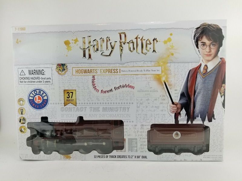 Photo 6 of Harry Potter 37 Piece Train Set Hogwart Express LIONEL Battery Powered Steam. Step through Platform 9 ¾ and take a ride on the Hogwarts Express! Witches, wizards and even Muggles can easily control this battery powered remote controlled train set. Featuri