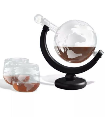Photo 3 of Studio Mercantile Whiskey Globe Decanter Set. Studio Mercantile whiskey decanter set steps up the style of any bottle. This earth-shaped decanter holds your favorite libations with a sophisticated look that seems more purposeful and planned on any shelf o