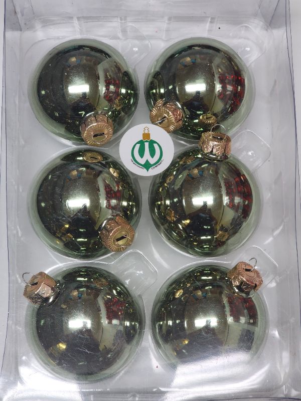 Photo 1 of Solid Colored Glass Ornament (Set of 6). The Whitehurst Company, LLC offers the most extensive collection of Solid Colored Glass ornaments. A most elegant and simple way to add the last dimension to a space. Light green is perfect all year long.