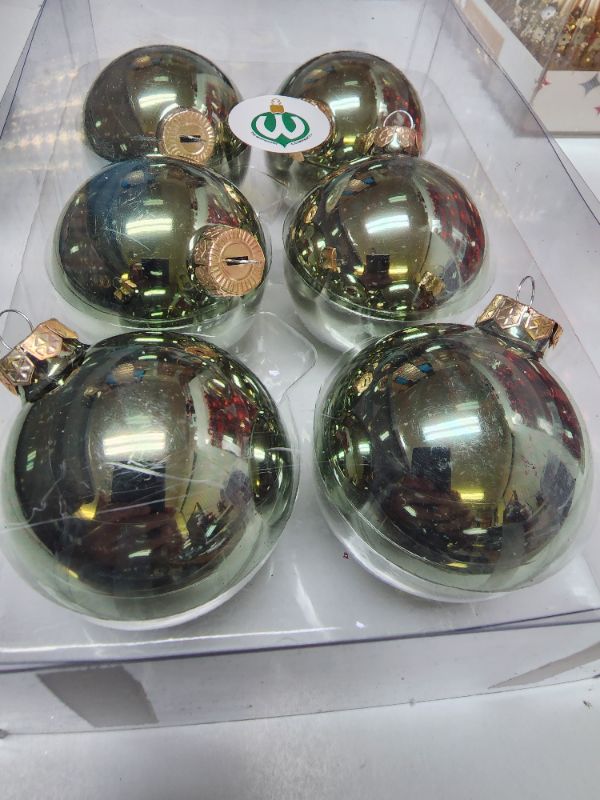 Photo 2 of Solid Colored Glass Ornament (Set of 6). The Whitehurst Company, LLC offers the most extensive collection of Solid Colored Glass ornaments. A most elegant and simple way to add the last dimension to a space. Light green is perfect all year long.