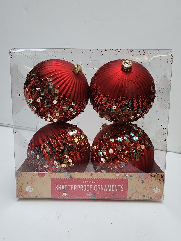 Photo 1 of Holiday Lane Christmas Cheer Set of 4 Shatterproof Decorated Red, Ball Ornaments. Festive decorate this assortment from Holiday Lane, a set of four shatterproof ornaments in classic colors. Approx. dimensions: 3.94" each