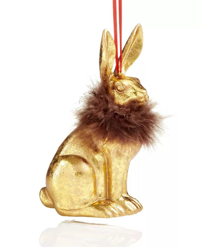 Photo 1 of Dress up a tree, wreath or gift during yuletide and spring celebrations with Holiday Lane's fashionable bunny ornament, featuring a distressed gold-tone finish with genuine feather trim around its neck. Approx. dimensions: 9cm x 5cm x 16cm